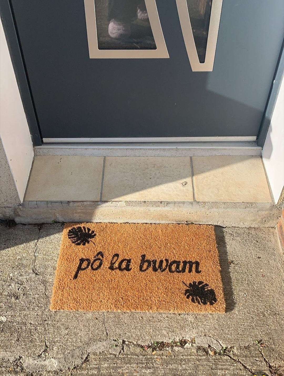 "Po la bwam" door mat- "Welcome" in Duala